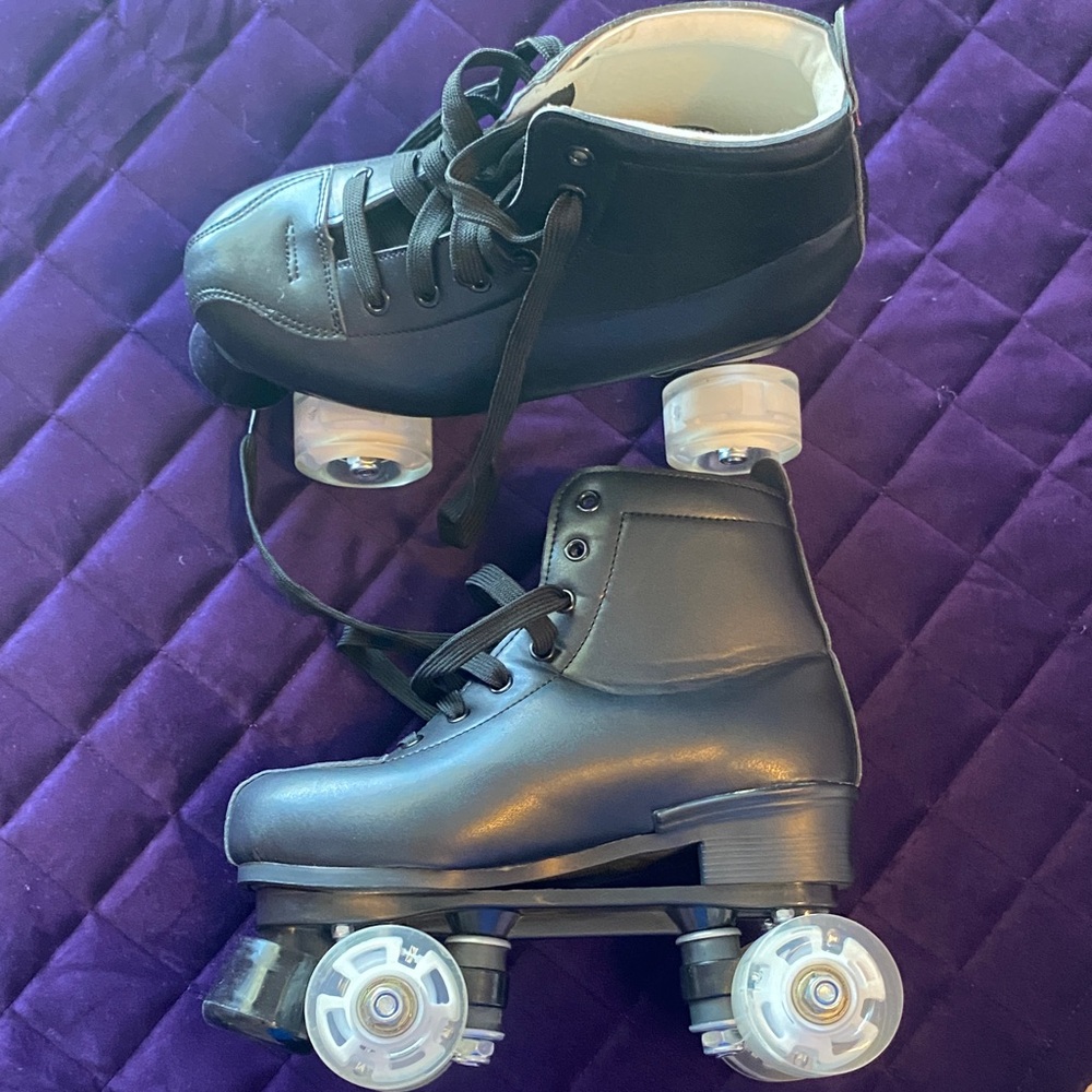 Black Roller Skates with White Wheels